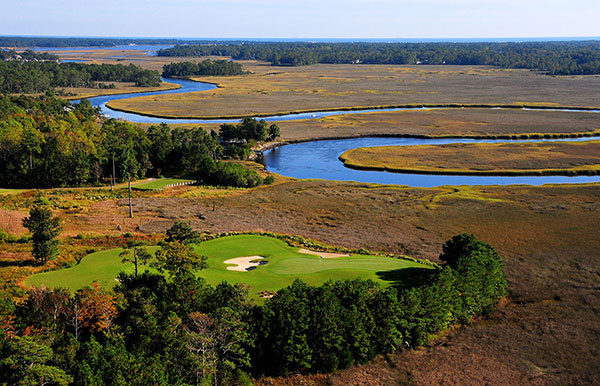 The fifth hole on the Heron nine is the signature hole at Carolina National